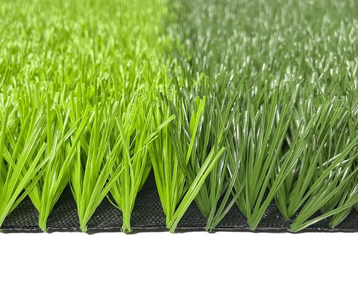 Green artificial turf of football field
