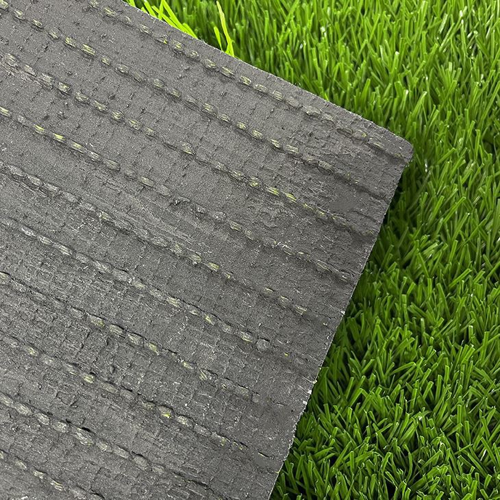 Green artificial turf of football field